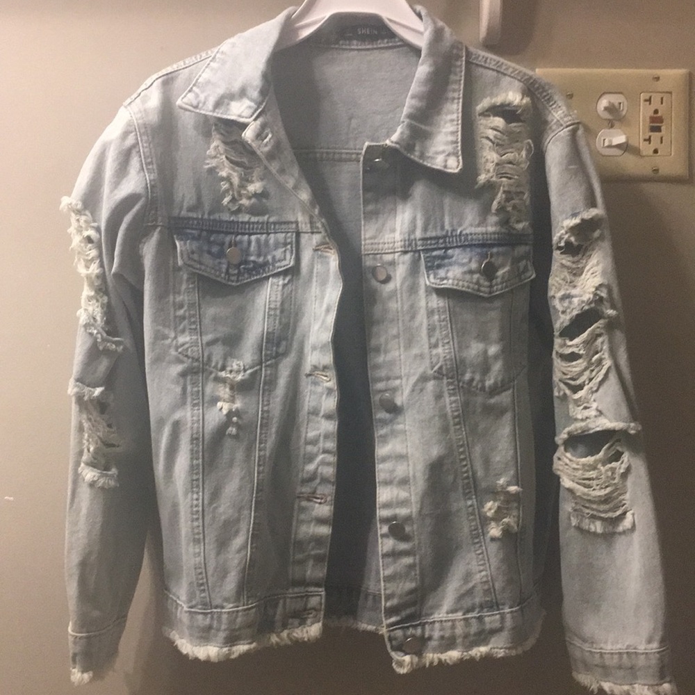 I’m selling a ripped jacket from SHEIN size Small